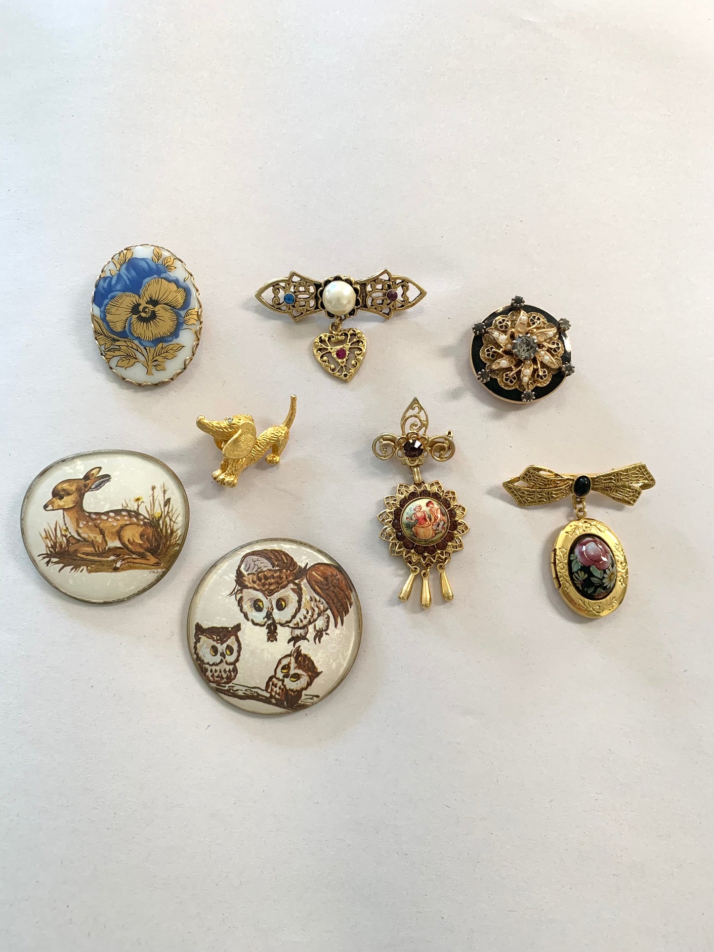 8 Brooches