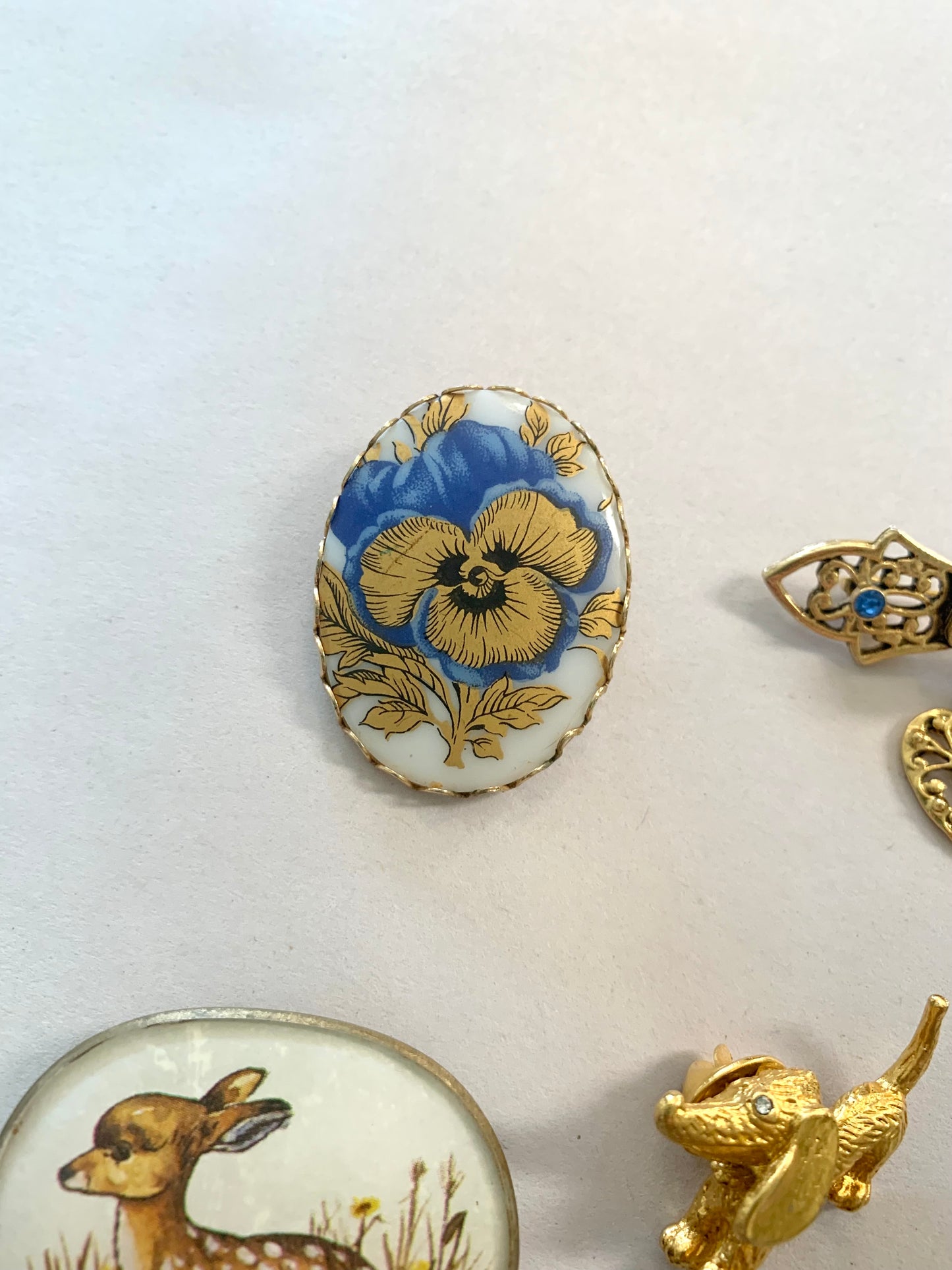 8 Brooches