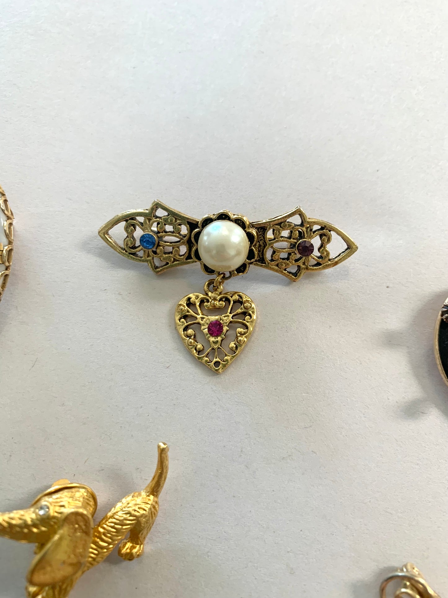 8 Brooches